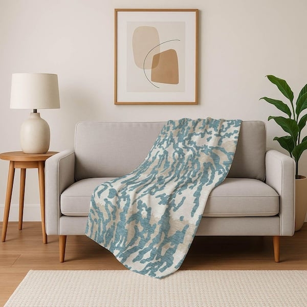 Throw Blanket: Reversible Teal Plush Fabric with Cozy Sherpa Lining.