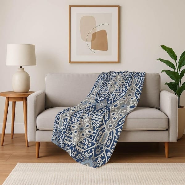 Throw Blanket: Solid Navy Woven Face, Contrasting Cream Sherpa Lining.