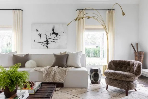 Throw Blanket: White Boucle Texture Draped on Dark Charcoal Sectional.