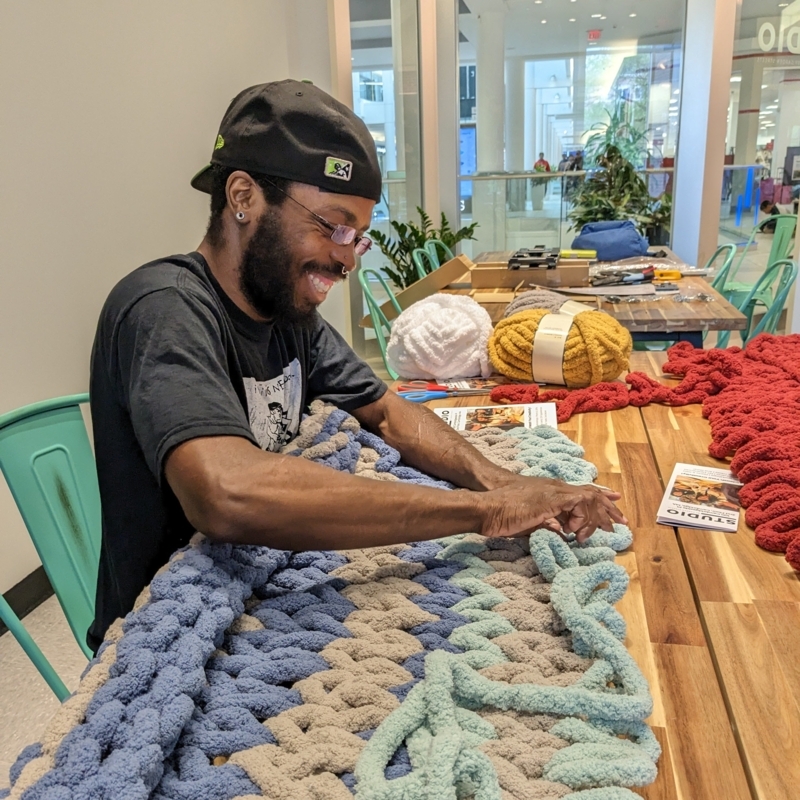 Throw Blanket with Oversized Braided Loops and Chunky Yarn