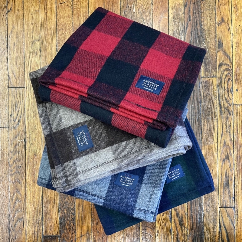 Throw Blankets Stack of Plaid Patterns with Fringed Edges
