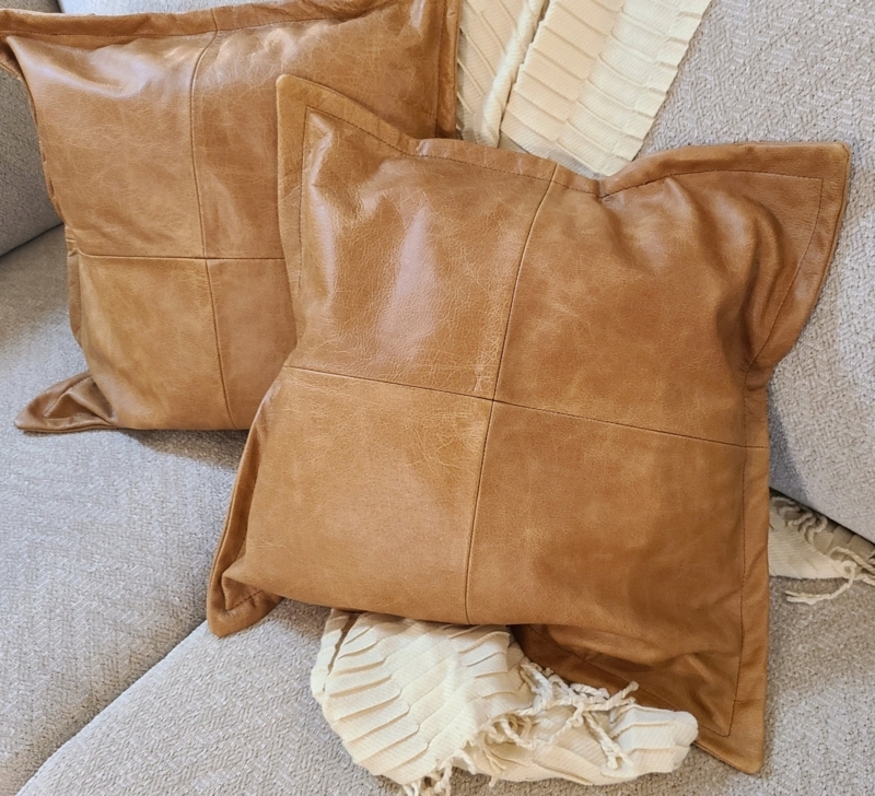 Throw Pillow: Caramel Brown Leather Throw Pillow with Lambskin Appearance.