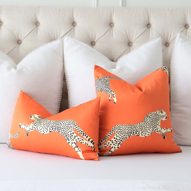 Throw Pillow featuring Clementine Orange and White Leaping Cheetah Print