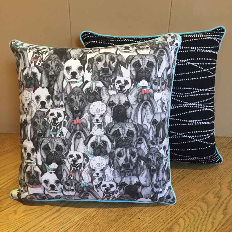 Throw Pillow Trio Styling with Mixed Textures and Floral Accent Print