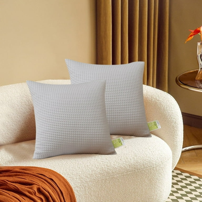 Throw Pillow: Waffle Weave Texture, Light Gray with Piped Edge Detail.