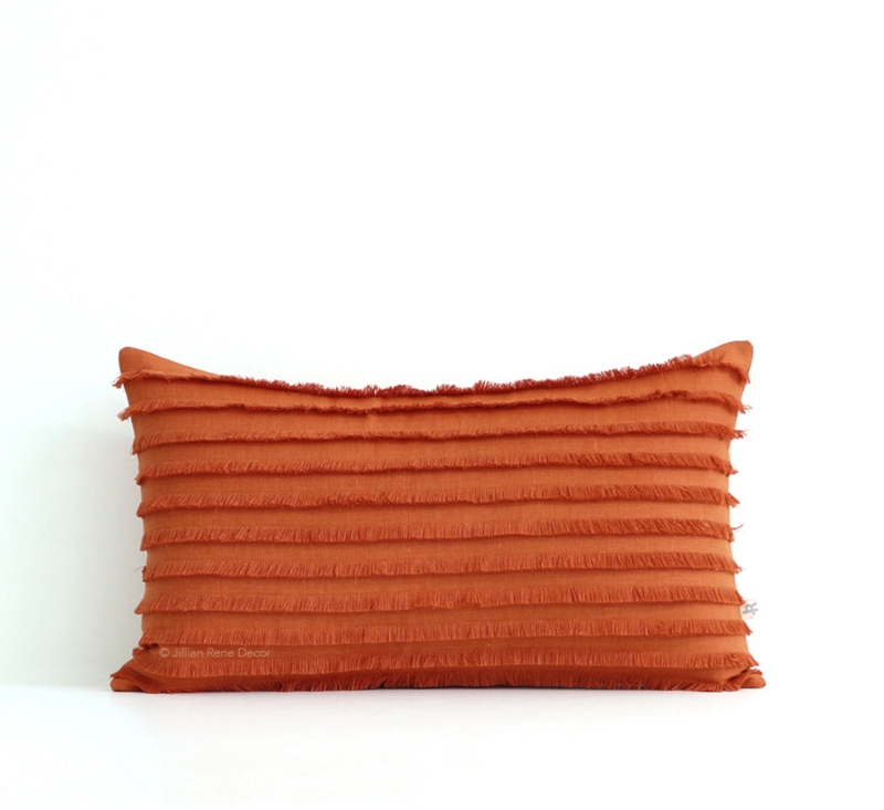 Throw Pillow with Layered Fringe Detail in Burnt Orange Linen-Like Fabric