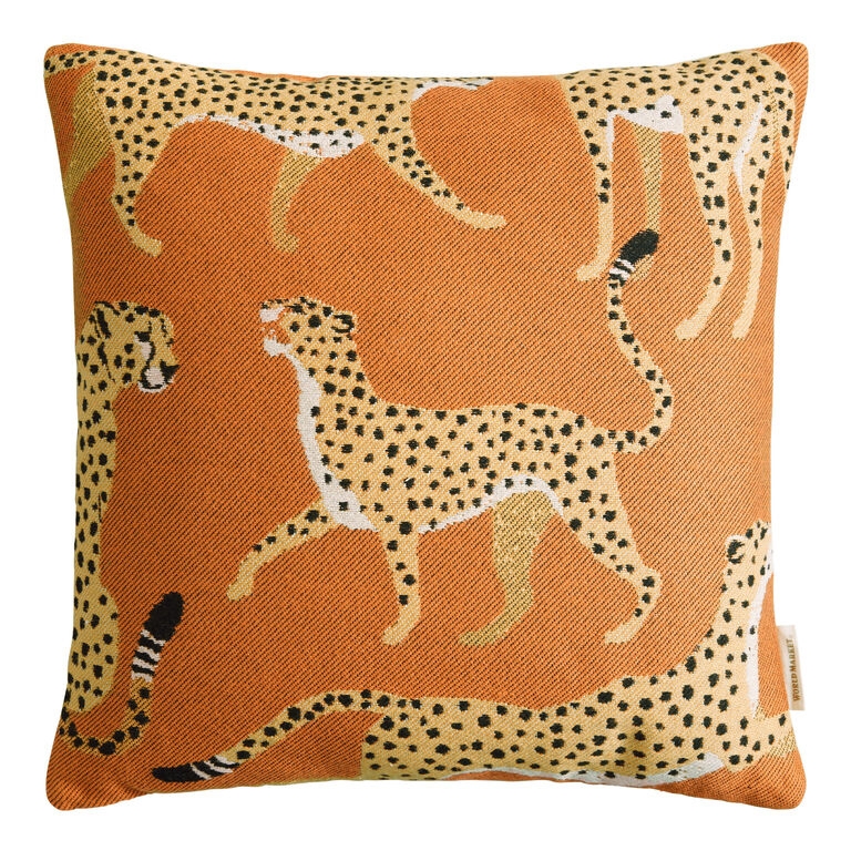 Throw Pillow with Orange and White Safari Cheetah Print and Piped Edges