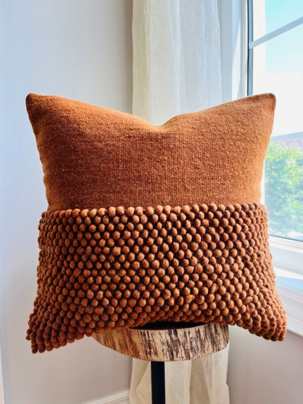 Throw Pillow with Slubby Woven Texture in Earthy Rust Orange