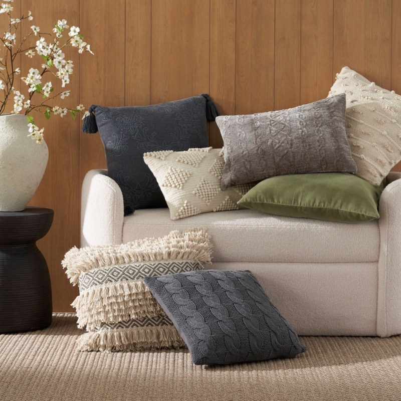 Throw Pillows Arrangement with Abstract Print and Boucle Texture