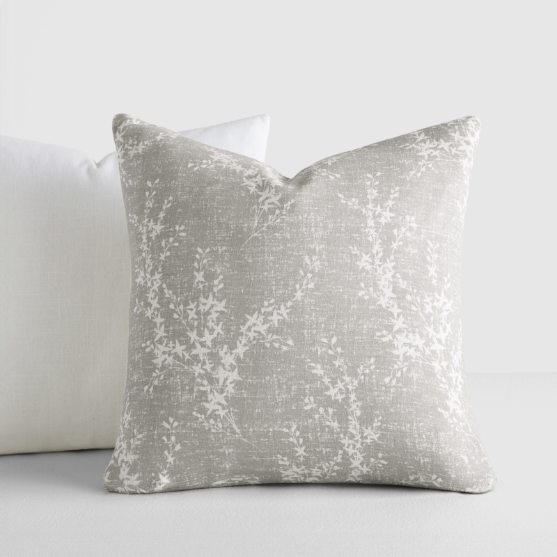 Throw Pillows set in light gray cotton-like slub fabric with piped edges