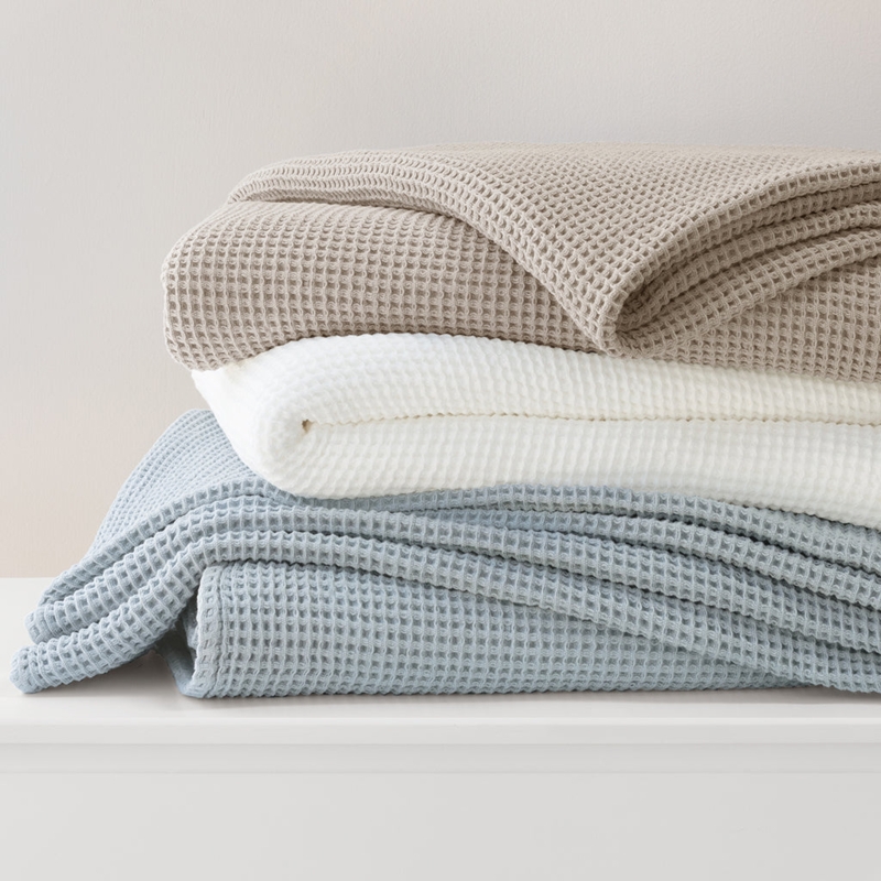 Tonal Stacked Waffle Blankets in Light Blue, Charcoal, and White