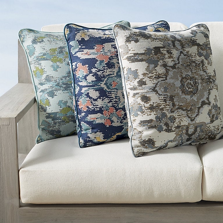Traditional Navy Throw Pillow with Medallion Print and Piping.