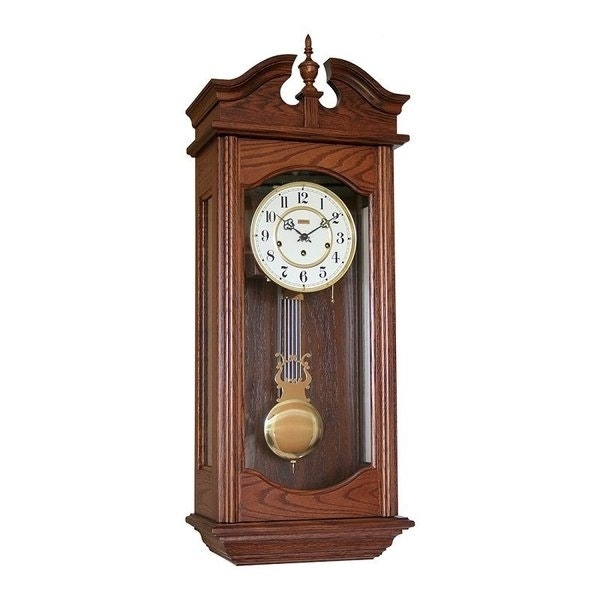 Traditional Wall Clock with Arched Crown and Visible Pendulum