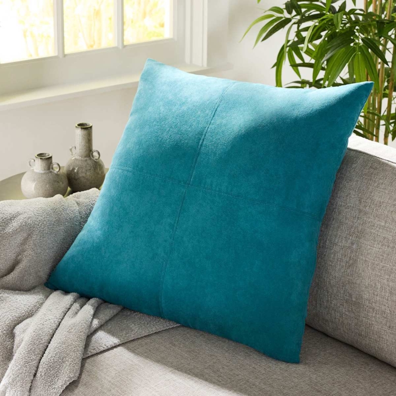 Turquoise Throw Pillow with Suede-like Texture and Piped Trim.