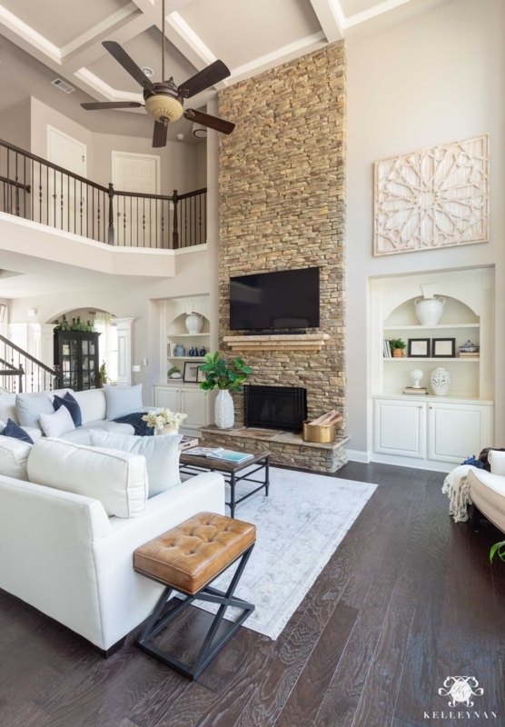 Two Story Ceiling Living Room with Symmetrical Mantel Decor