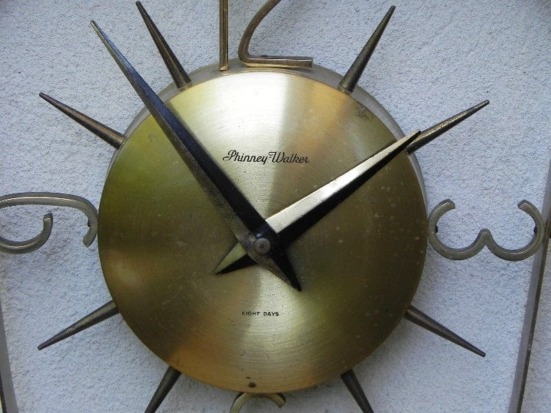 Wall Clock Floating Face Script Numerals Polished Metal Mid-Century