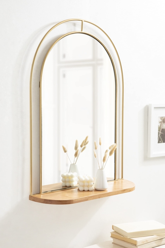 Wall Mirror arched silhouette includes practical integrated shelf.