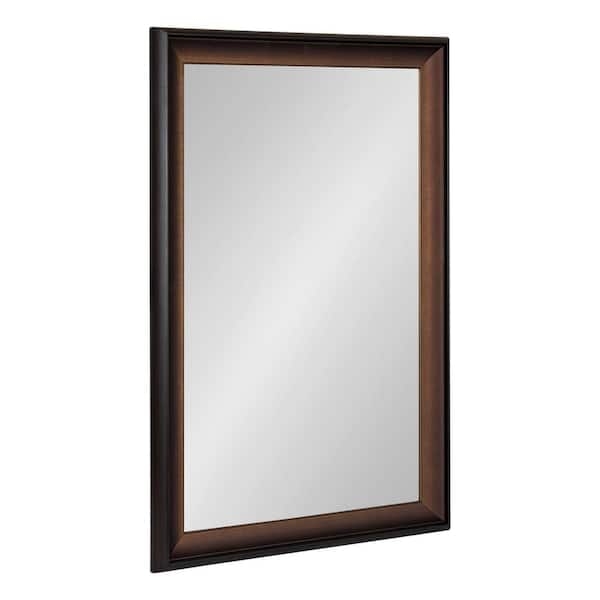 Wall Mirror rectangular leaning style with thin bronze frame.