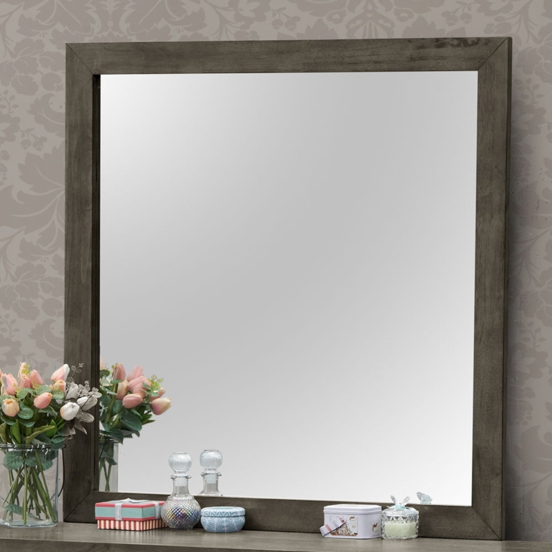Wall Mirror slender profile features beveled inner frame.