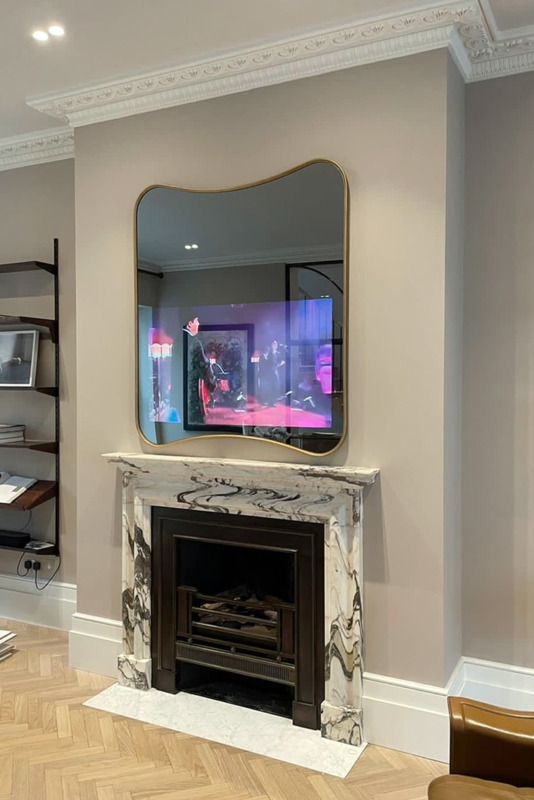 Wall Mirror with Curved Corners and a Slim Gold Frame