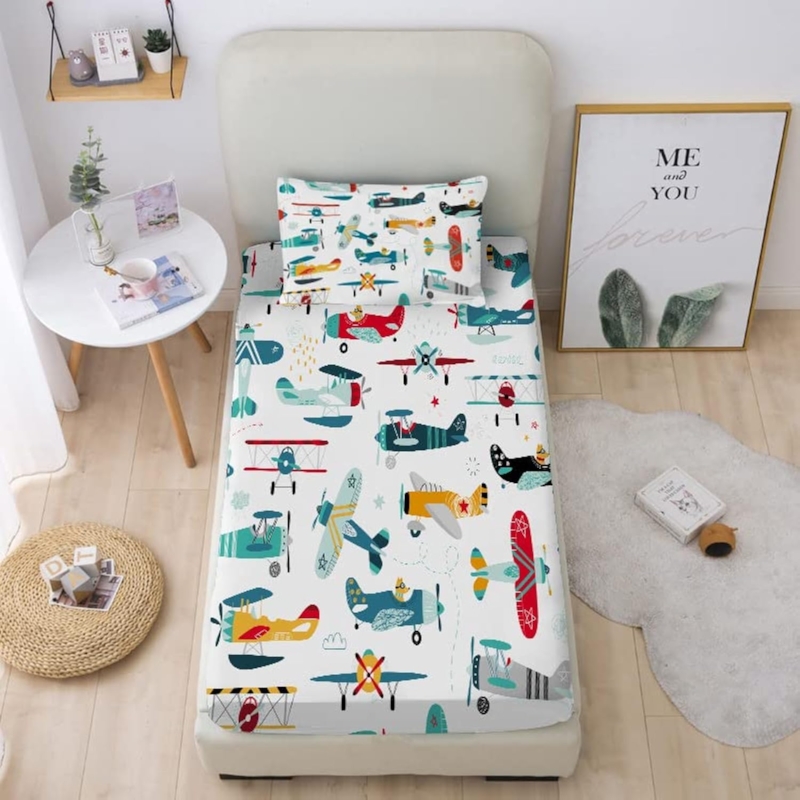 Bed Sheets: Whimsical Cartoon Airplane Print on Sky Blue Background.