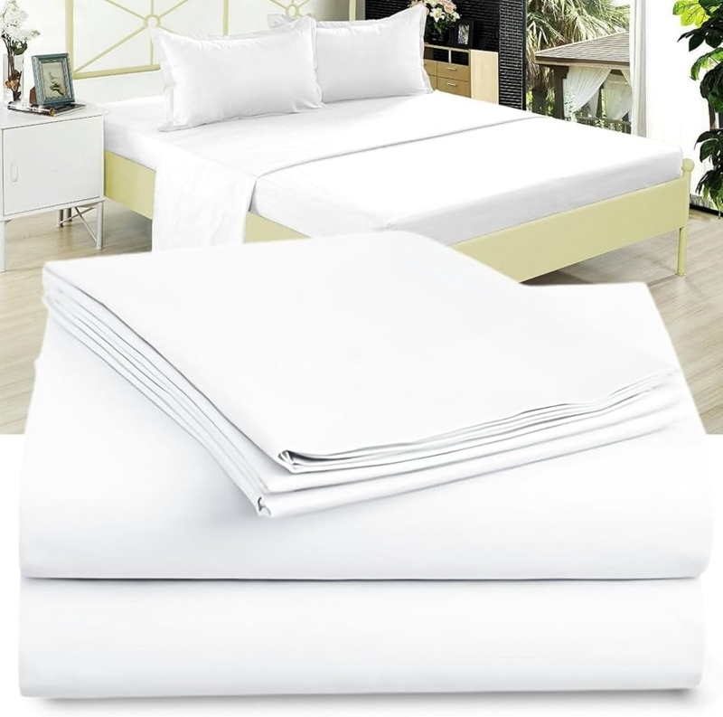 Bedding Set: Crisp White Hotel Style Sheets with Upholstered Headboard.