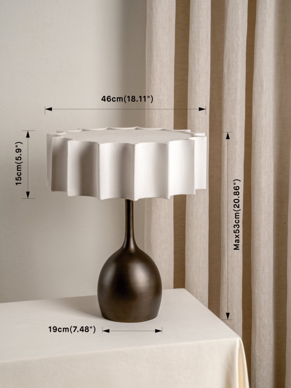 Bronze Table Lamp with Tiered Circular Stand for Modern Accent Lighting.
