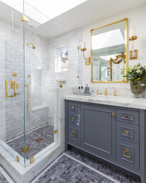 Built-In Shower Bench in White Marble Tile with Pebble Floor