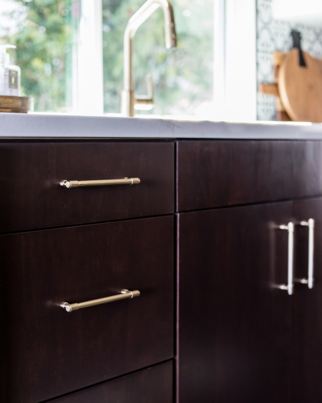Cabinet Handle: Gold Hardware on Navy Cabinets, Brushed T-Bar Style.