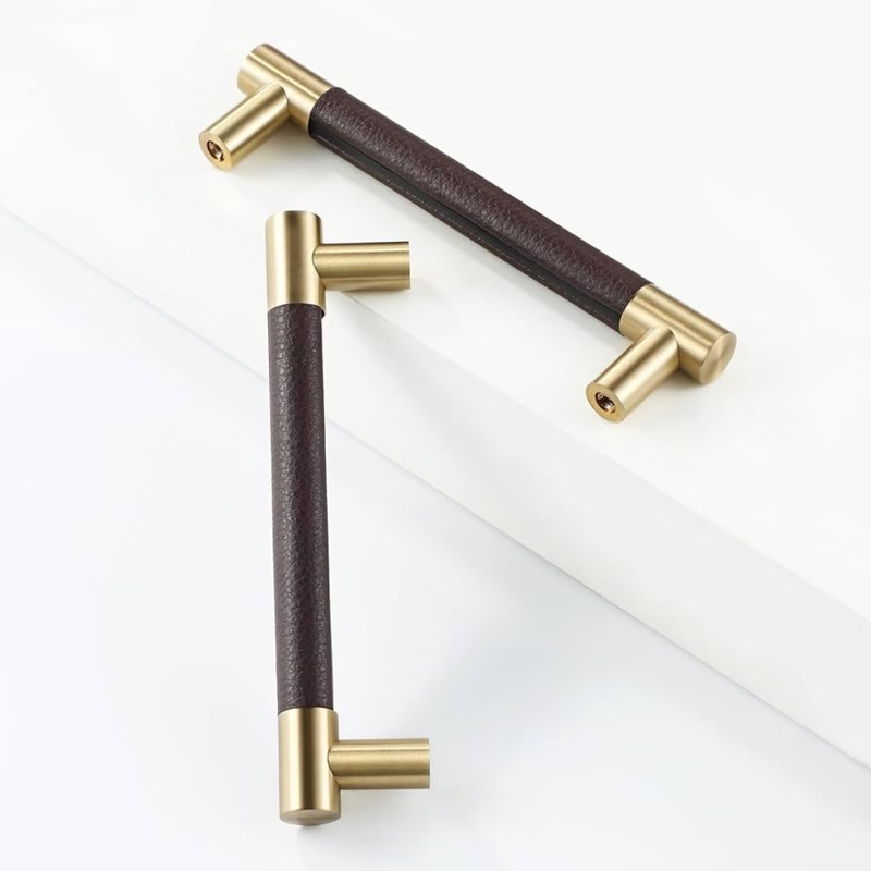 Cabinet Pull: Modern Gold and Brown Pulls with Leather Wrapped Accents.