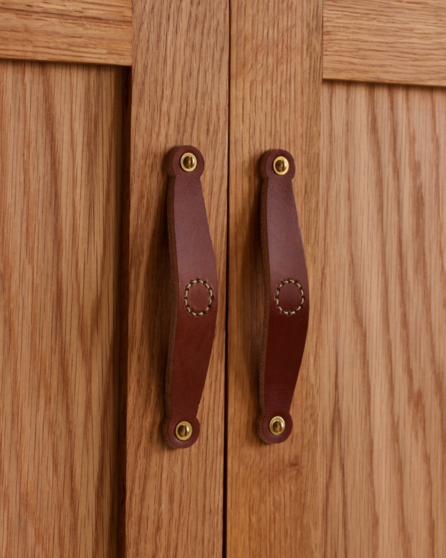 Cabinet Pull: Modern Leather Cabinet Hardware with a Bowtie Silhouette.