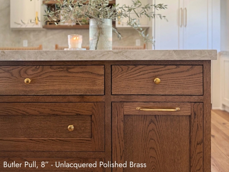Cabinet Pull: Polished Brass Appliance Hardware with Cylindrical Bar.
