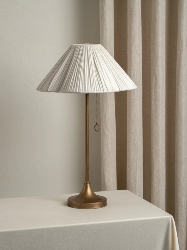Candlestick Table Lamp with Scalloped Shade and Aged Brass Finish.
