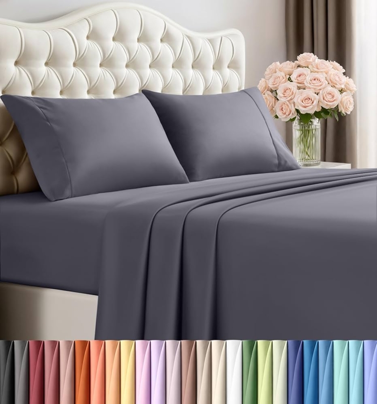 Charcoal Grey Sheet Set with Tufted White Headboard Styling.