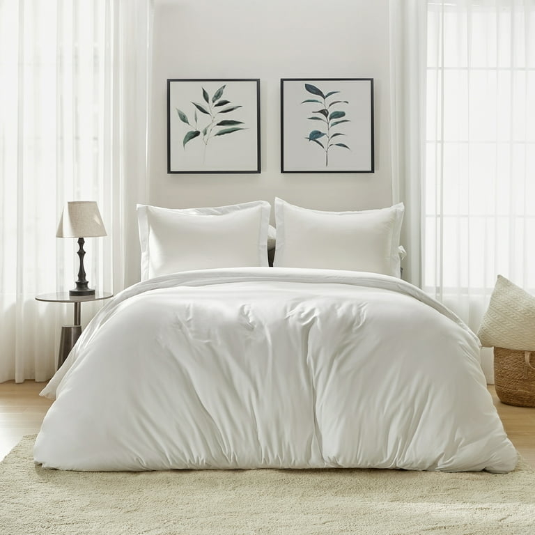 Crisp White Duvet Cover Set on Tufted Upholstered Bed