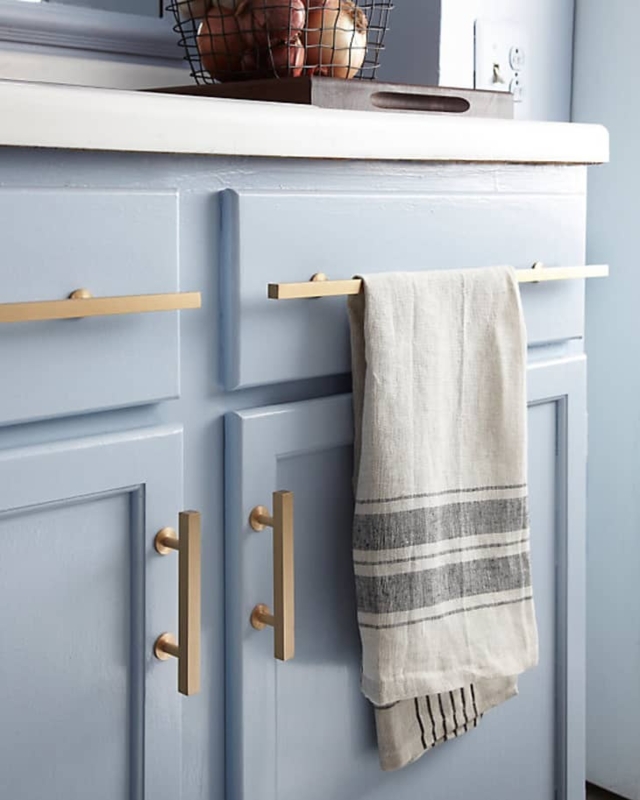 Elongated Cabinet Bar Pulls: Brushed Brass on Serene Light Blue Cabinetry.