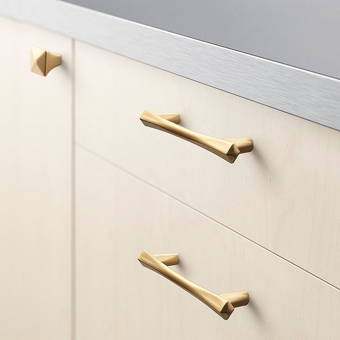 Gold Bar Pulls on Teal Shaker Cabinetry for Modern Kitchens