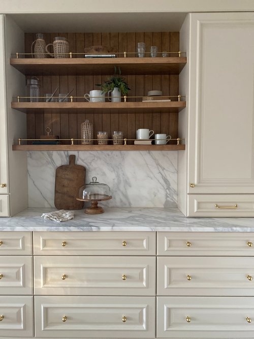 Kitchen Cabinetry: Cream Shaker Cabinets, Brass Hardware, Woven Stools