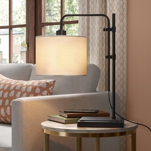Matte Black Table Lamp with Conical Fabric Shade and Adjustable Arm