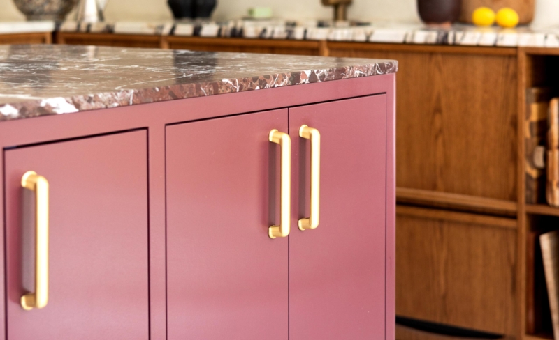 Mixed Cabinet Hardware Styles on Dark Green Shaker Kitchen Cabinetry