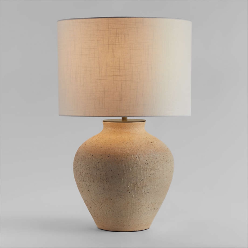 Organic Modern Bulbous Table Lamp with Pitted Texture Base.