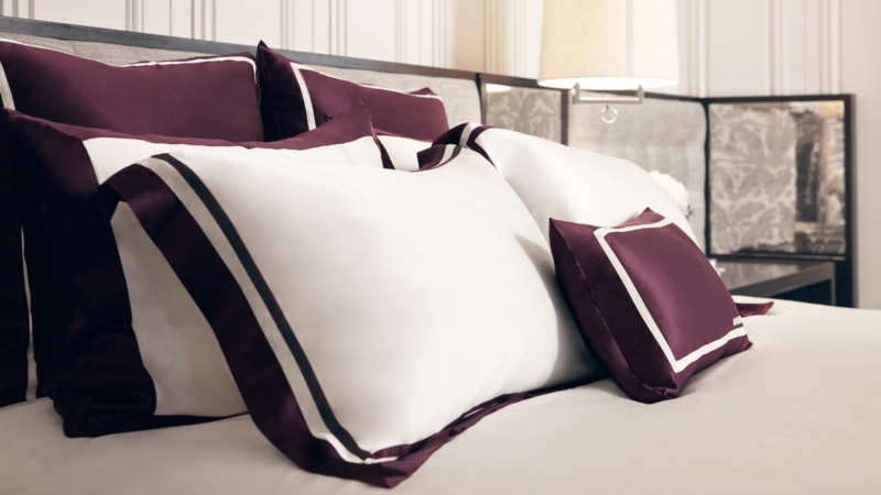 Pillowcase with Silk Sheen being placed in Top Loading Machine