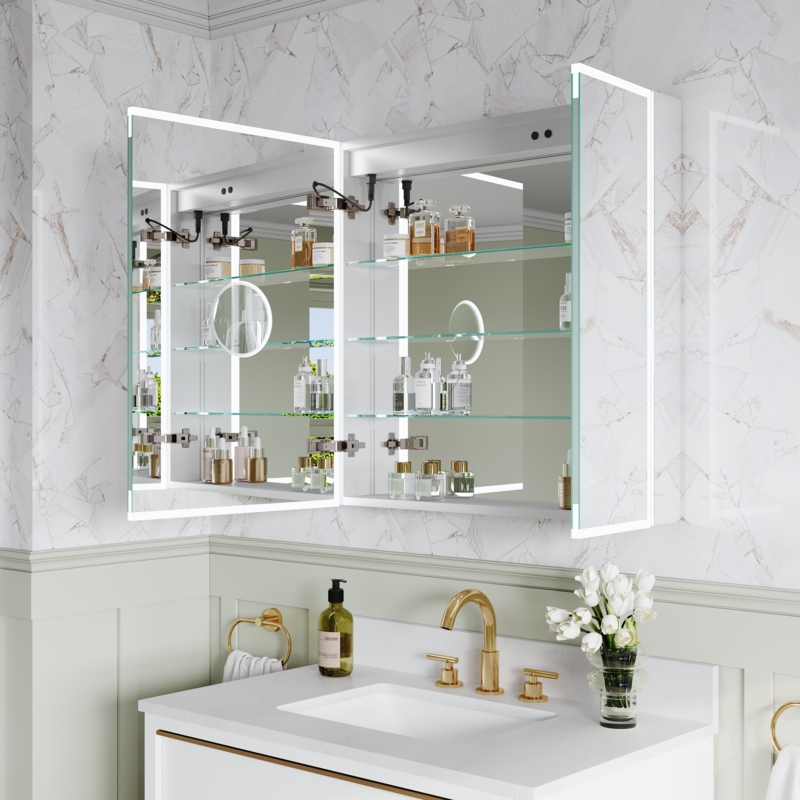Polished Silver Medicine Cabinet featuring Magnifying Mirror and LED Border.