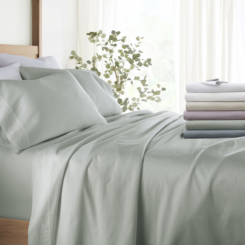 Sheet Set in Muted Sage Green with Natural Wood Headboard
