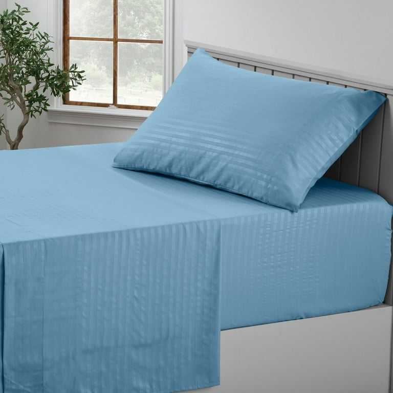 Sheet Set: Navy Blue Folded Set Featuring Hemstitch Detail on Pillowcase.