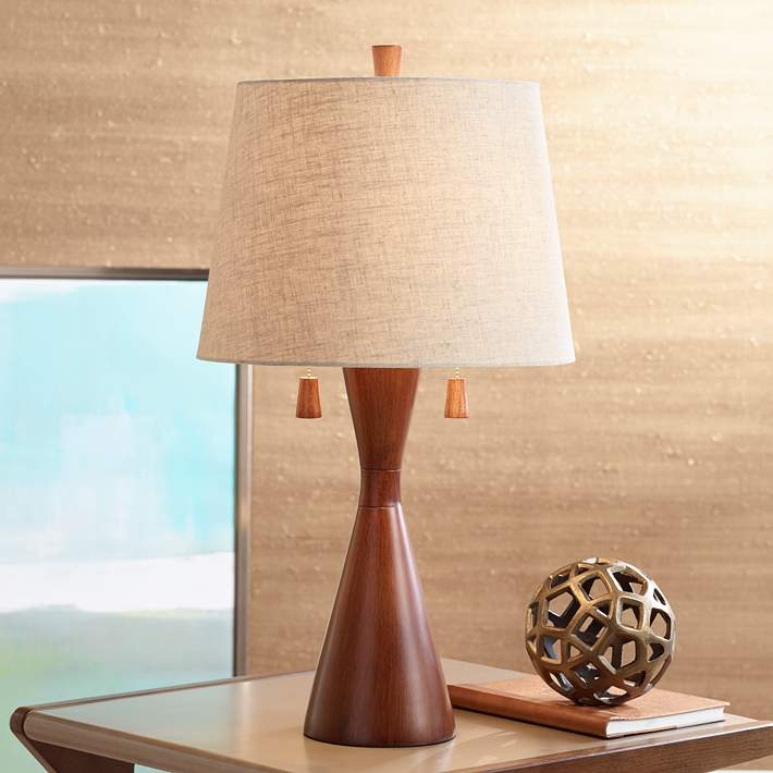 Sleek Hourglass Table Lamp with Dark Wood Toned Finish & Drum Shade