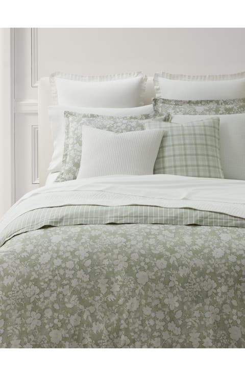 Stack of Ribbed and Quilted Cotton Quilts in Earthy Tones