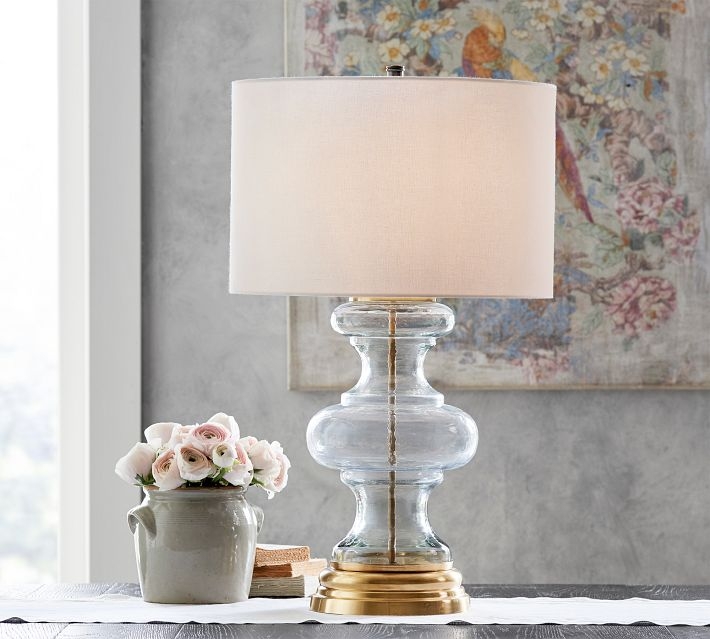 Table Lamp: Curvy Clear Glass Base, Brass Accents for Transitional Styling