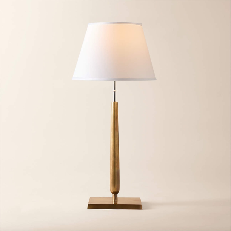 Table Lamp: Minimalist Soft Bronze Cylinder Base, Elongated Drum Shade.