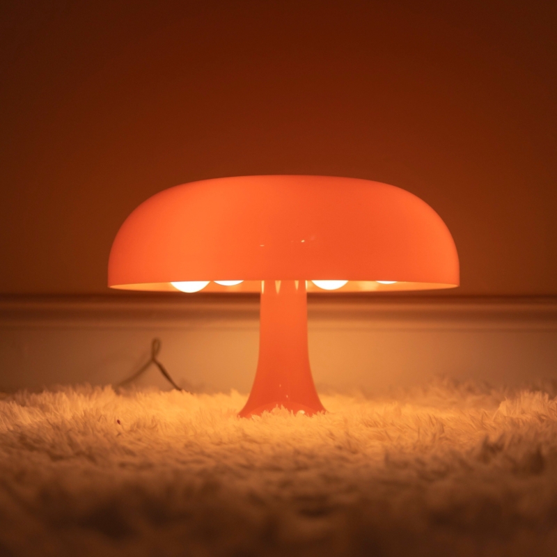 Table Lamp: Pleated Glass Shade on Wood-Toned Disk Base, Warm Glow